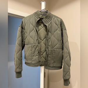 Green bomber jacket.